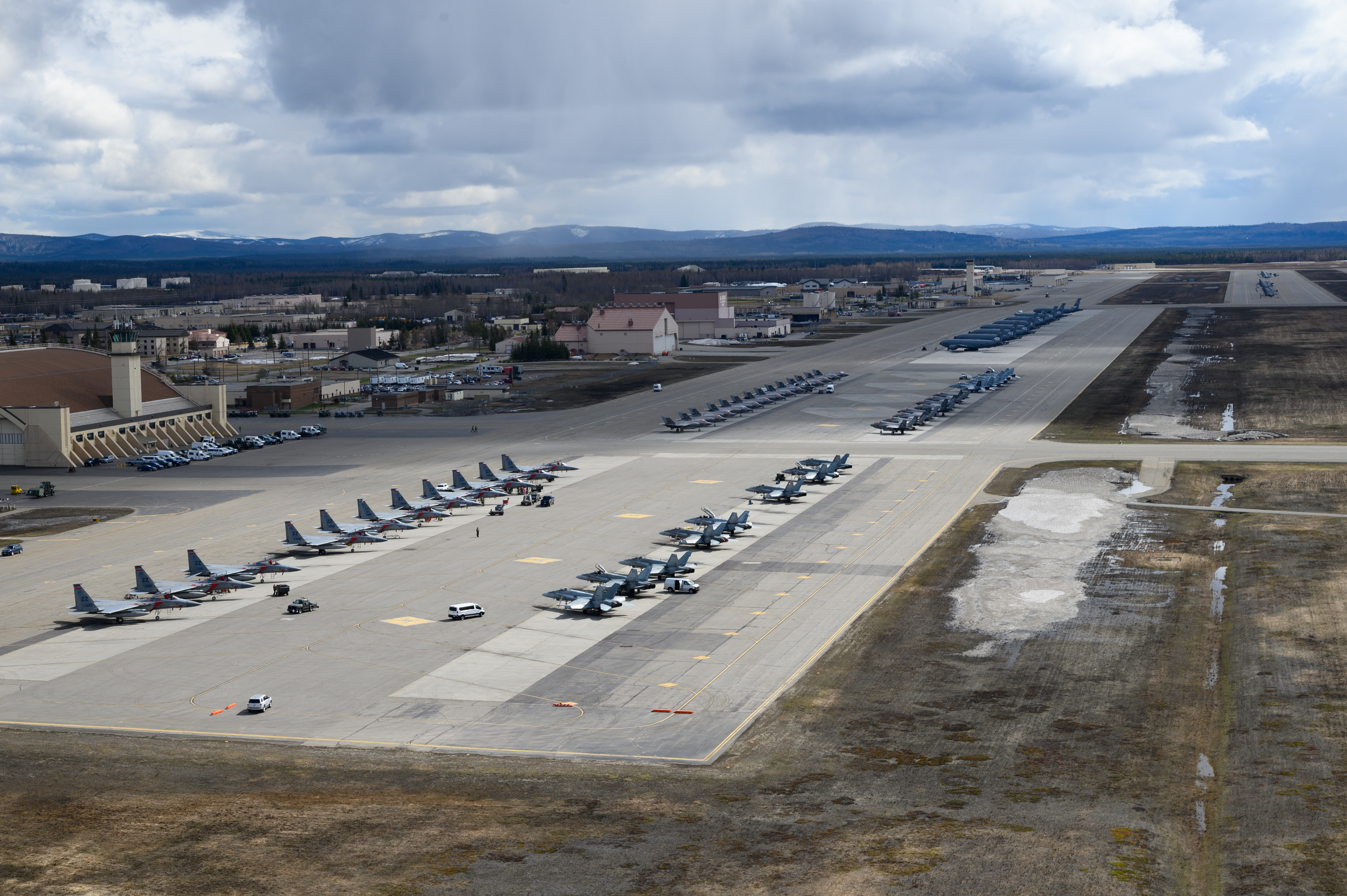 U.S. Air Force, U.S. Navy, U.S. Marine Corps and Royal Canadian Air Force aircraft sit on the flightline at Eielson Air Force Base, Alaska, during RED FLAG-Alaska 22-1, May 13, 2022. (U.S. Air Force photo by Senior Airman Jose Miguel T. Tamondong)