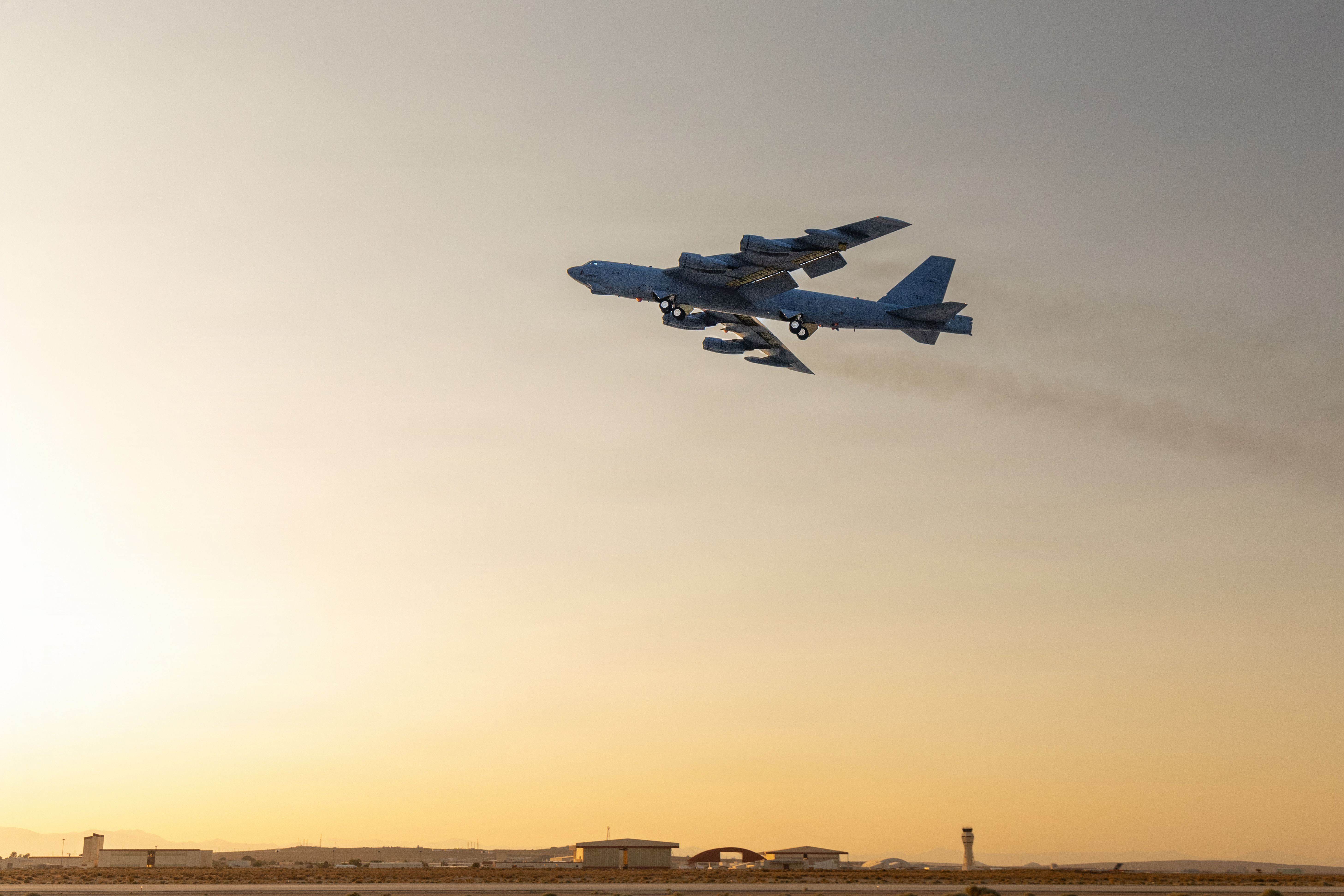 A B-52H Stratofortress assigned to the 419th Flight Test Squadron at Edwards Air Force Base, California, departs for an evening test mission over the Mojave Desert