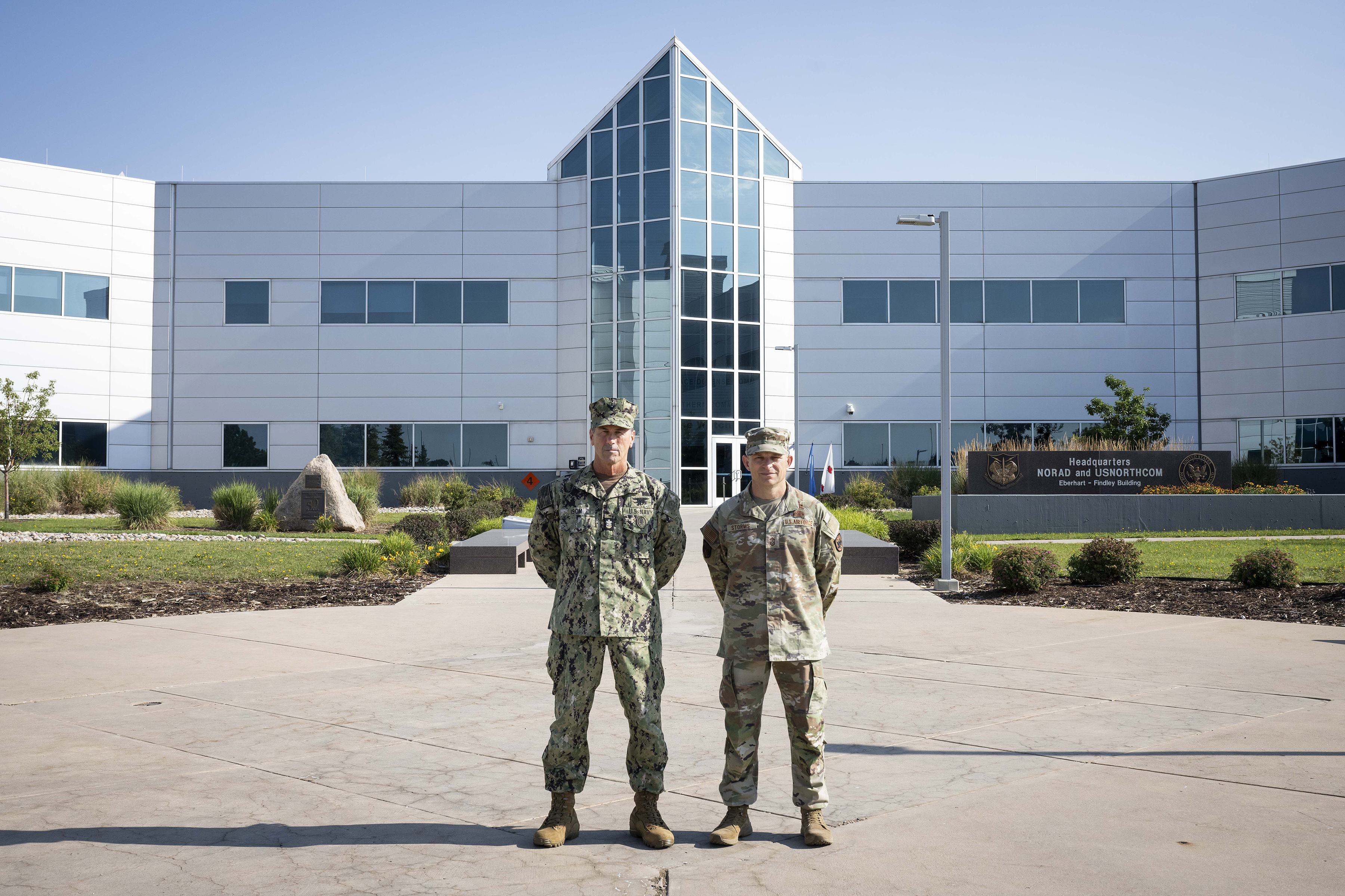 Chief Master Sgt. John Storms, Command Senior Enlisted Leader, North American Aerospace Defense Command and U.S. Northern Command, welcomes Senior Enlisted Advisor to the Chairman of the Joint Chiefs of Staff David Isom, July 30, 2025, to the NORAD and USNORTHCOM Headquarters, Peterson Space Force Base, Colorado