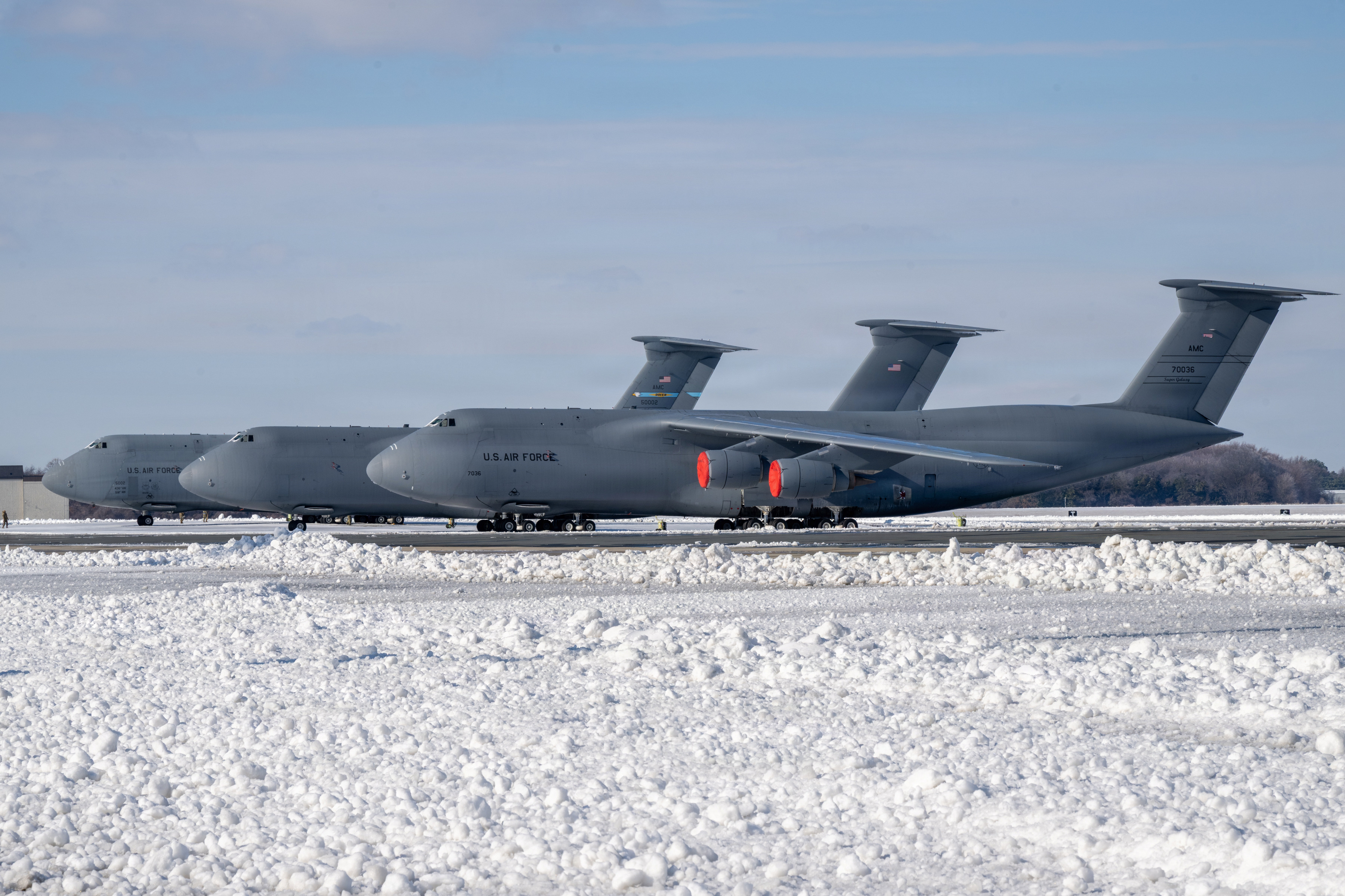 Three C-5M Super Galaxies sit on the flightline at Dover Air Force Base, Delaware, Jan 26, 2025