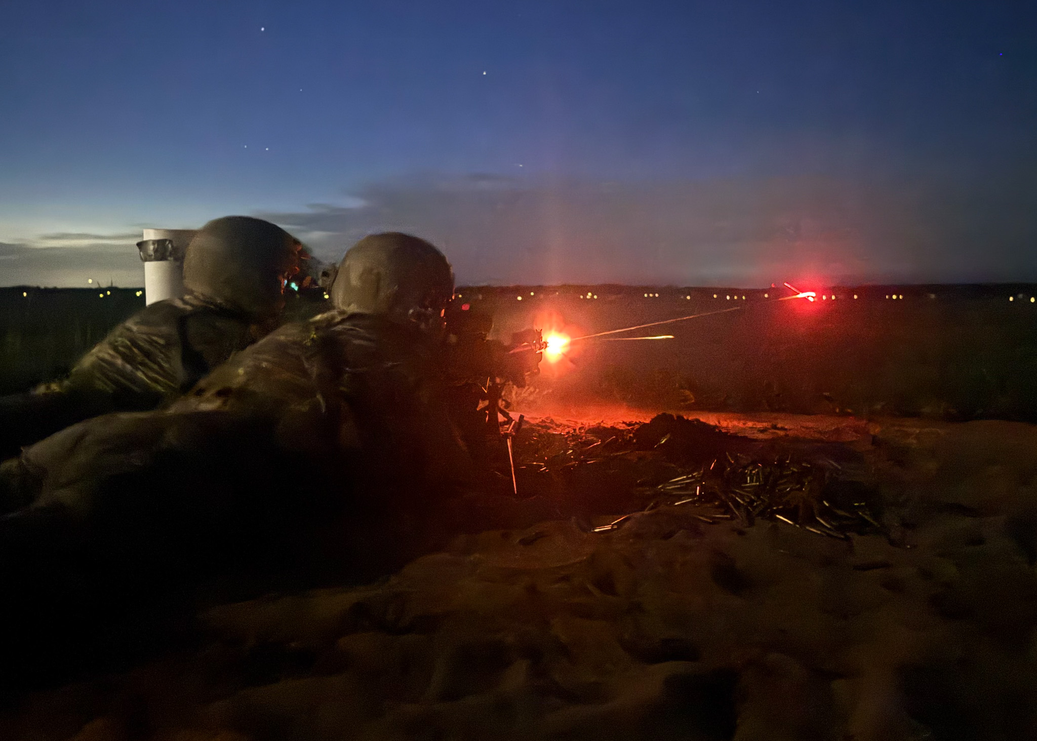 Green Berets from 2nd Battalion, 7th Special Forces Group (Airborne) fire upon targets during the dark of night at an M240 Medium Machine Gun range on Eglin Air Force Base, Florida, on July 30th, 2025