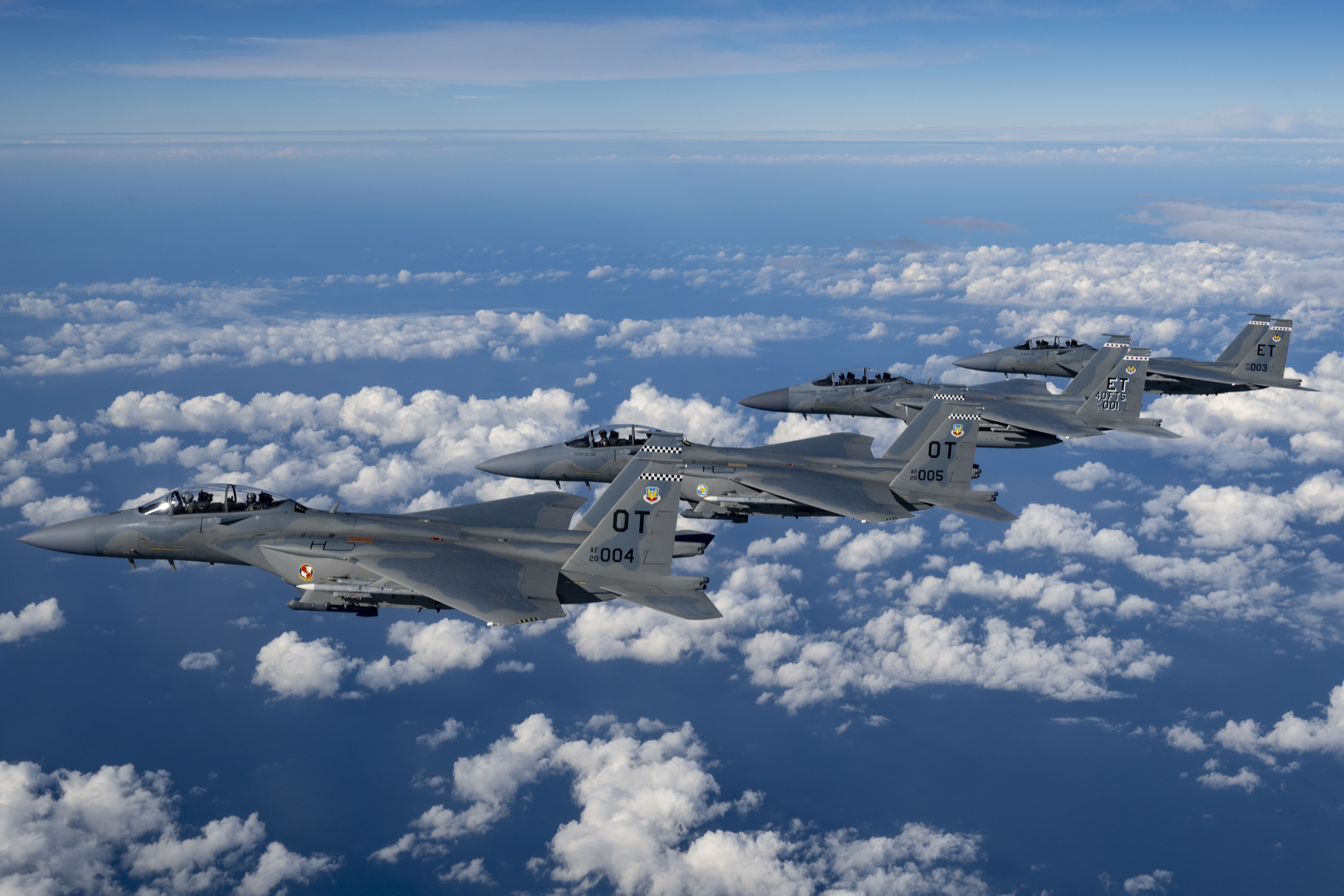A formation of four U.S. Air Force F-15EX Eagle II fighter jets, assigned to Eglin Air Force Base, Florida, fly over the Gulf of America, Nov. 21, 2025
