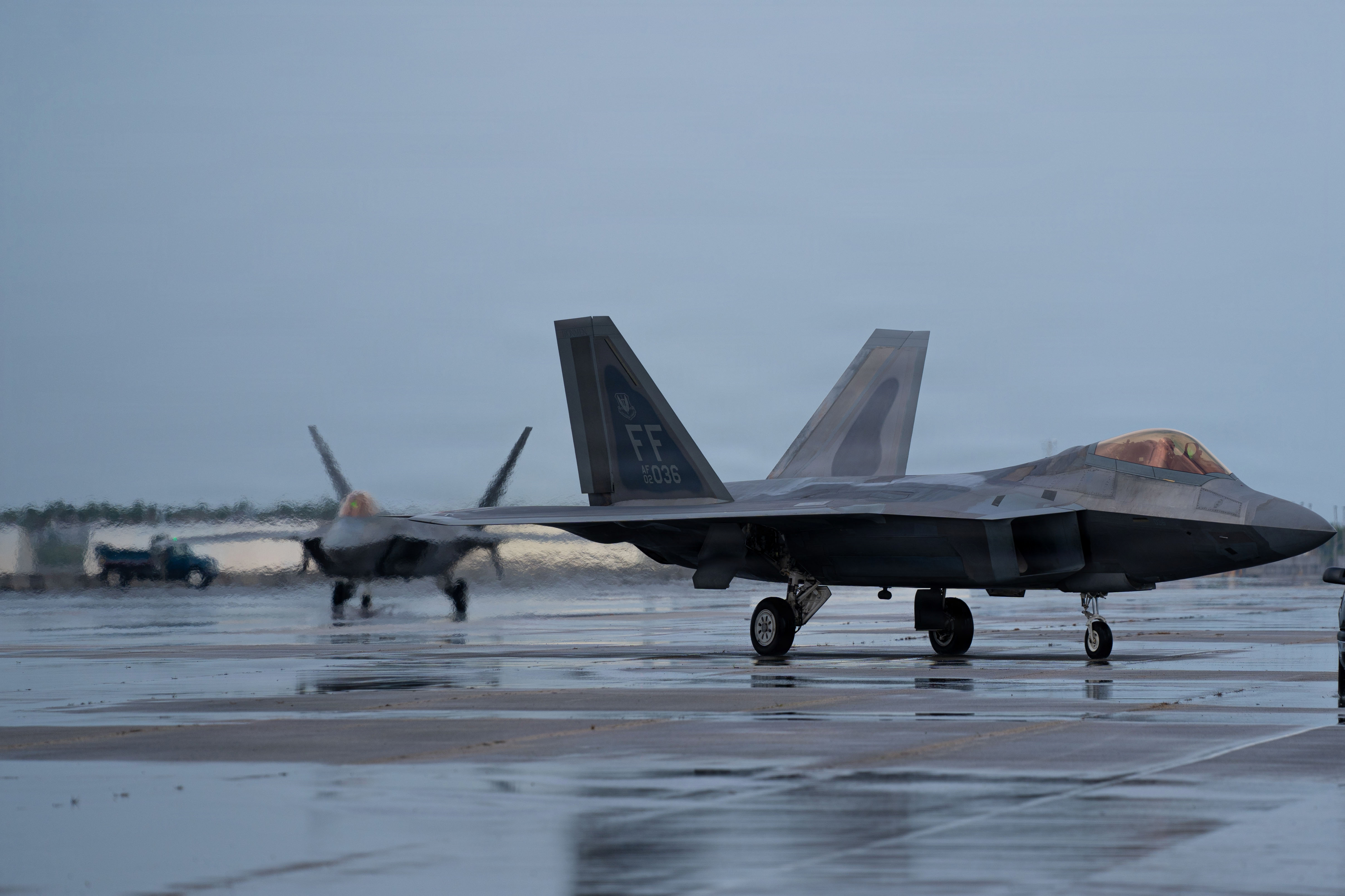 Members of the F-22 Raptor Aerial Demonstration Team perform at the Homestead ARB Air Show 2023, Miami, FL, April 1st, 2023