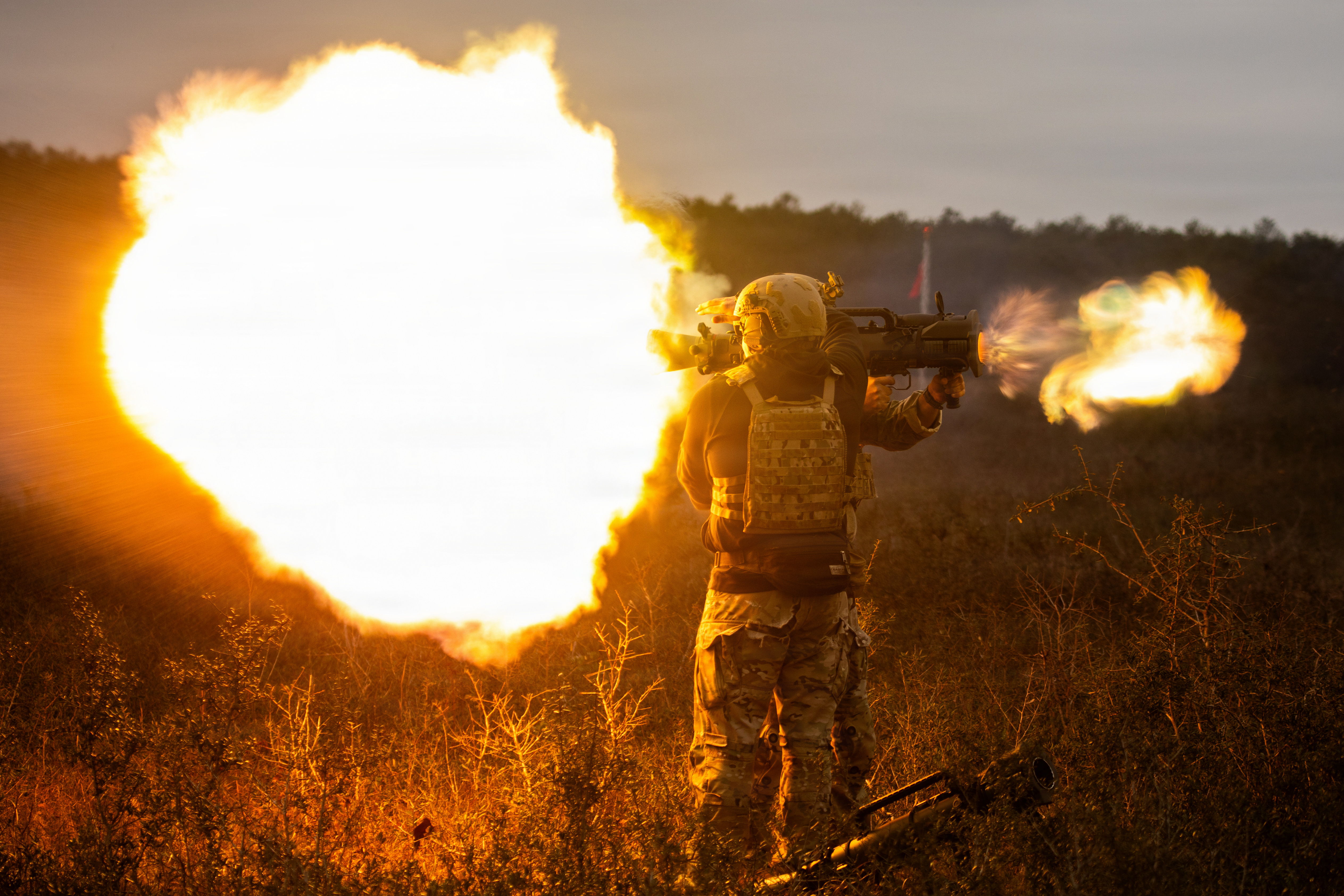 A U.S. Army Green Beret assigned to 7th Special Forces Group (Airborne) fires a Carl Gustaf recoilless rifle during live-fire training at Eglin Air Force Base, Florida, Jan. 23, 2026