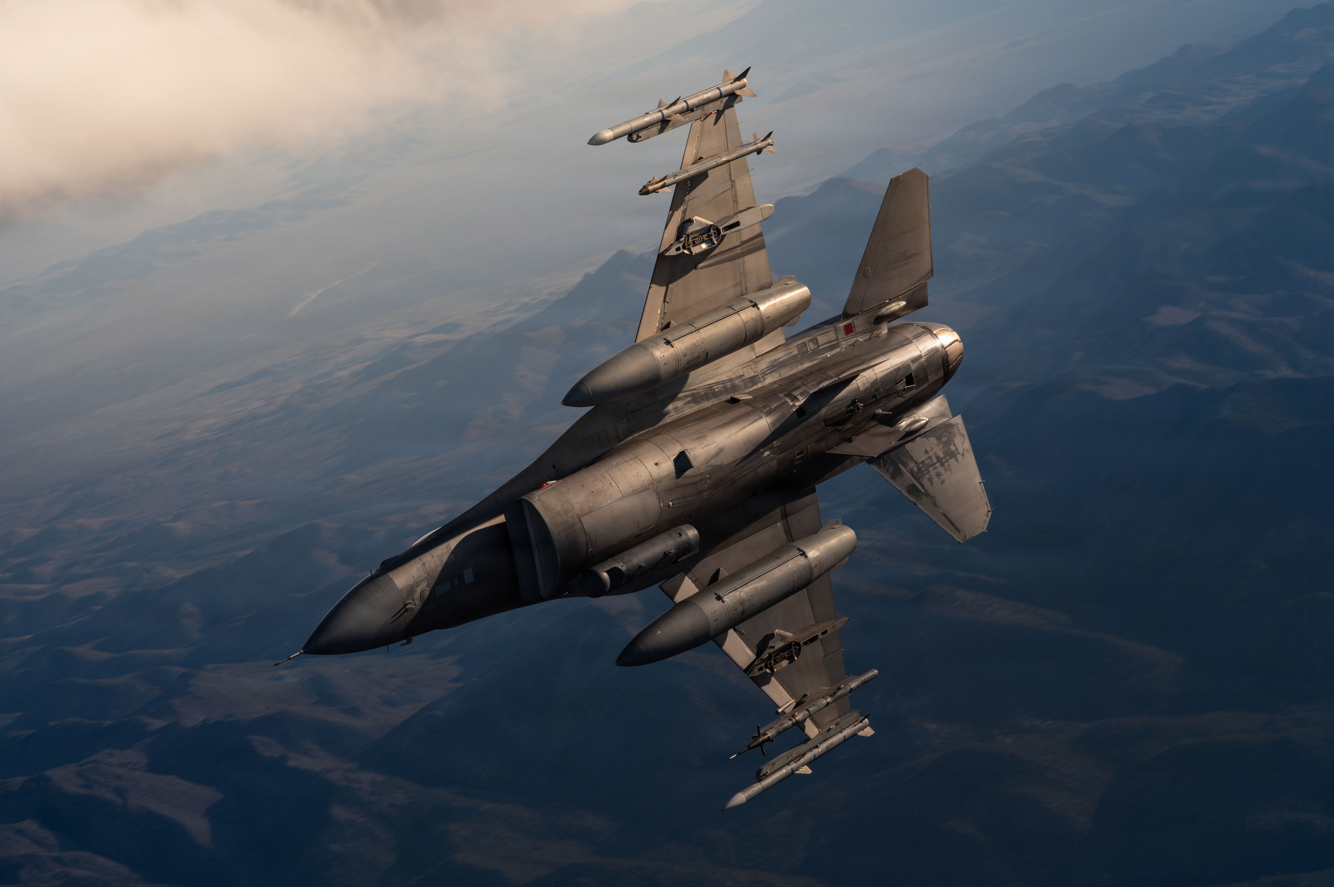 A U.S. Air Force F-16C Fighting Falcon assigned to the HomesteadAir Reserve Base Florida flies during Red Flag-Nellis 26-1 over Nevada, Feb. 6, 2026