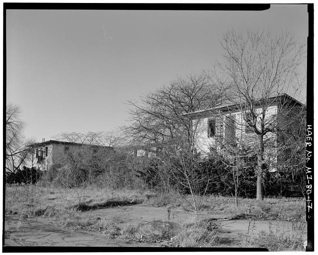 VIEW SOUTHWEST, NEAR MAIN GATE GUARD SHACK, mess hall/administration